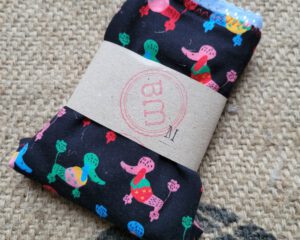 Hipslip „Poodles on Black“